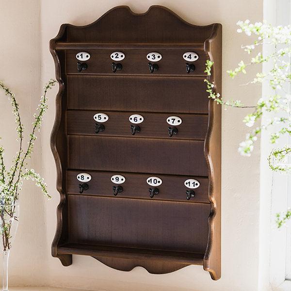 Vintage wall-mounted cup rack