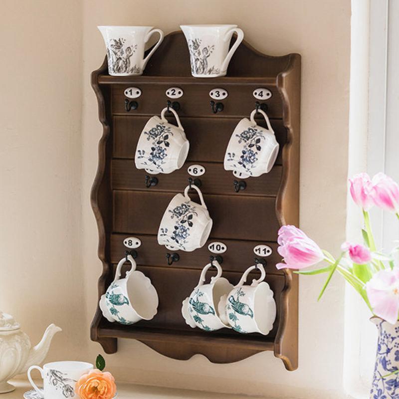 Vintage wall-mounted cup rack