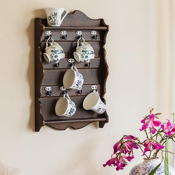 Vintage wall-mounted cup rack